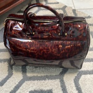 Saint Laurent brown animal print shoulder bag. New no tag. Authentic purse